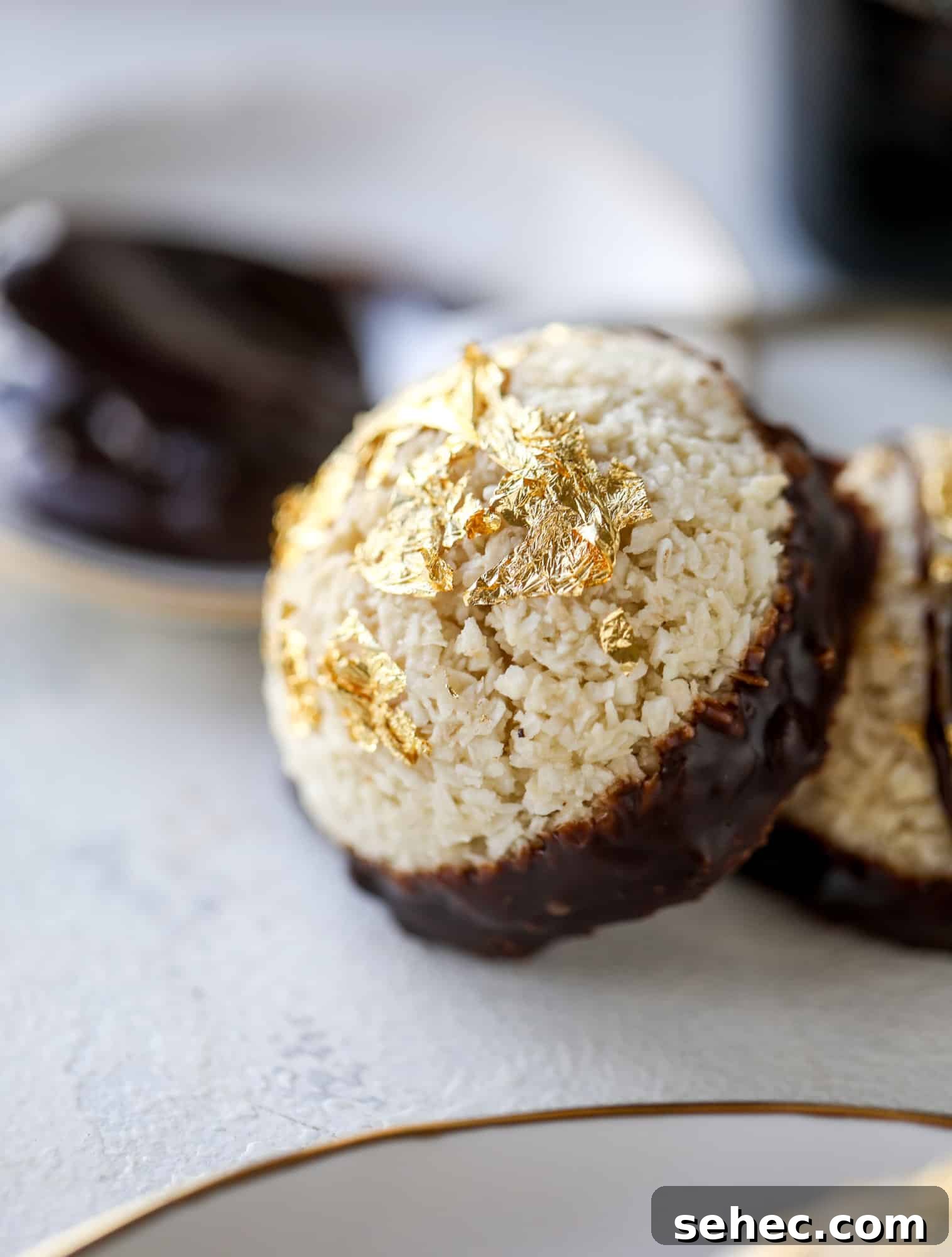 Irish Cream Coconut Macaroons Recipe 8 Classic chewy, slightly gooey coconut macaroons dipped in an irish cream chocolate ganache. Easy to make and gluten free too! I howsweeteats.com #irishcream #coconutmacaroons