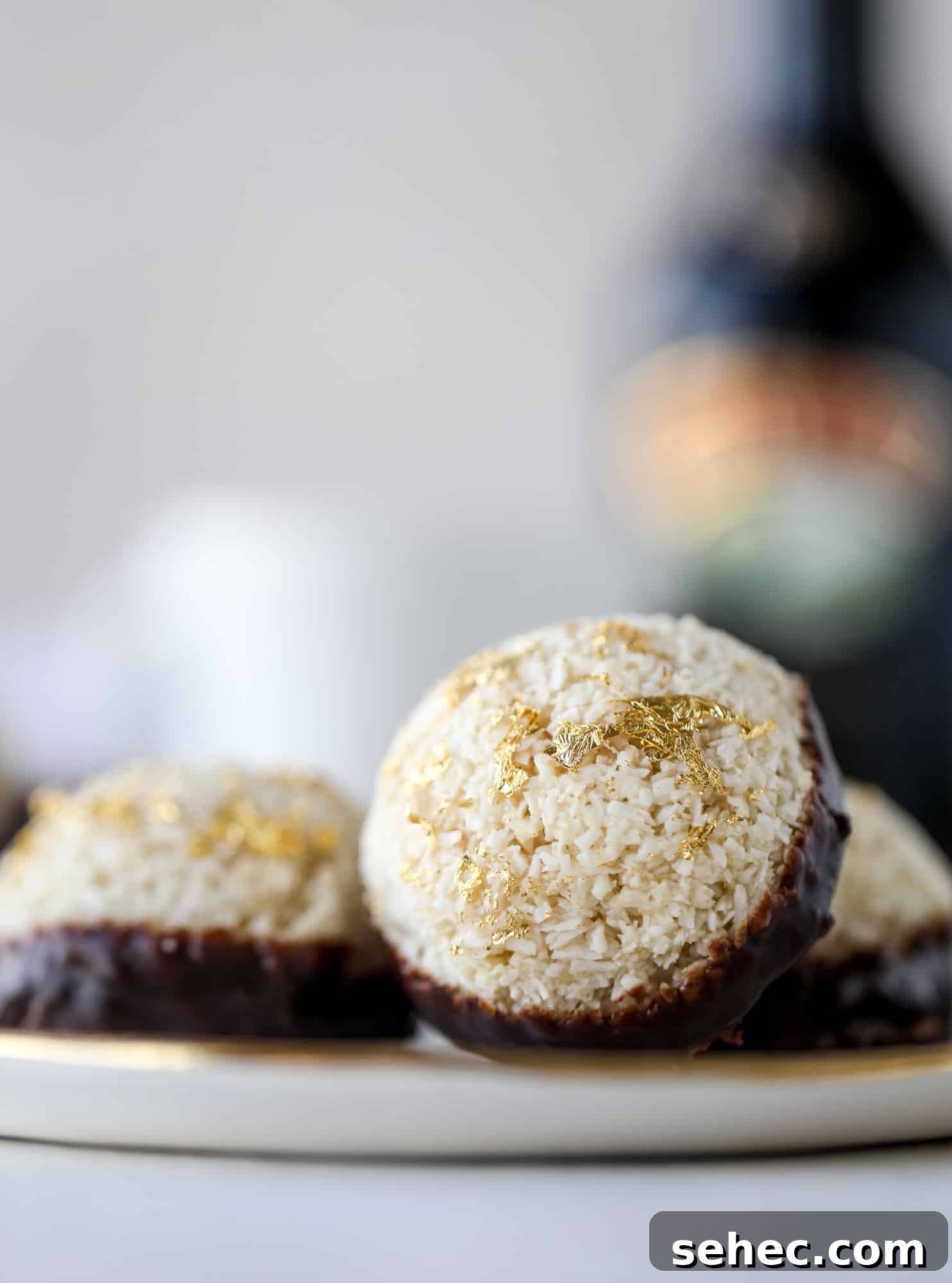 Irish Cream Coconut Macaroons Recipe 10 Classic chewy, slightly gooey coconut macaroons dipped in an irish cream chocolate ganache. Easy to make and gluten free too! I howsweeteats.com #irishcream #coconutmacaroons