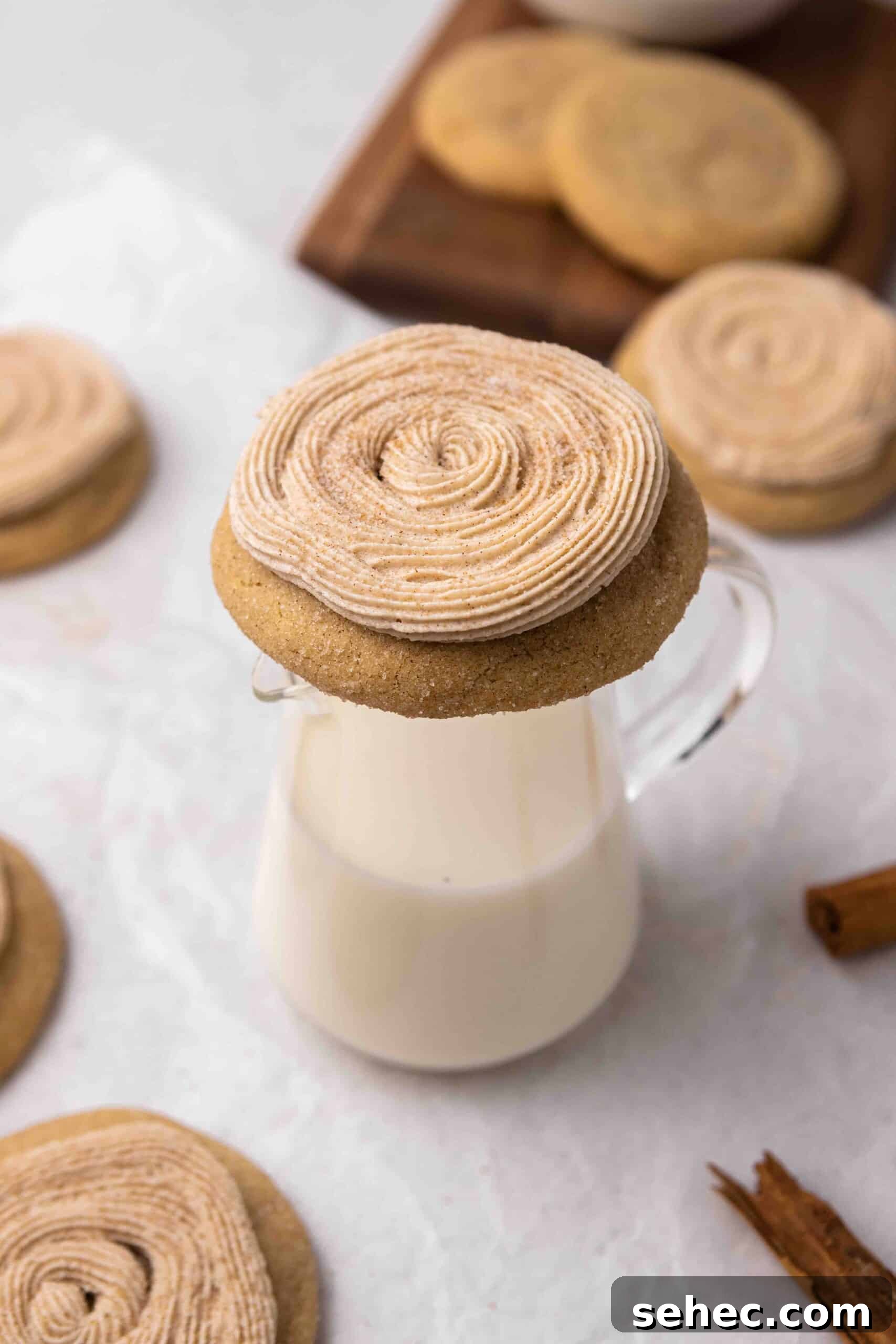 40 Crumbl Cookie Copycat Recipes to Try in 2025 40 Crumbl churro cookie on a glass of milk
