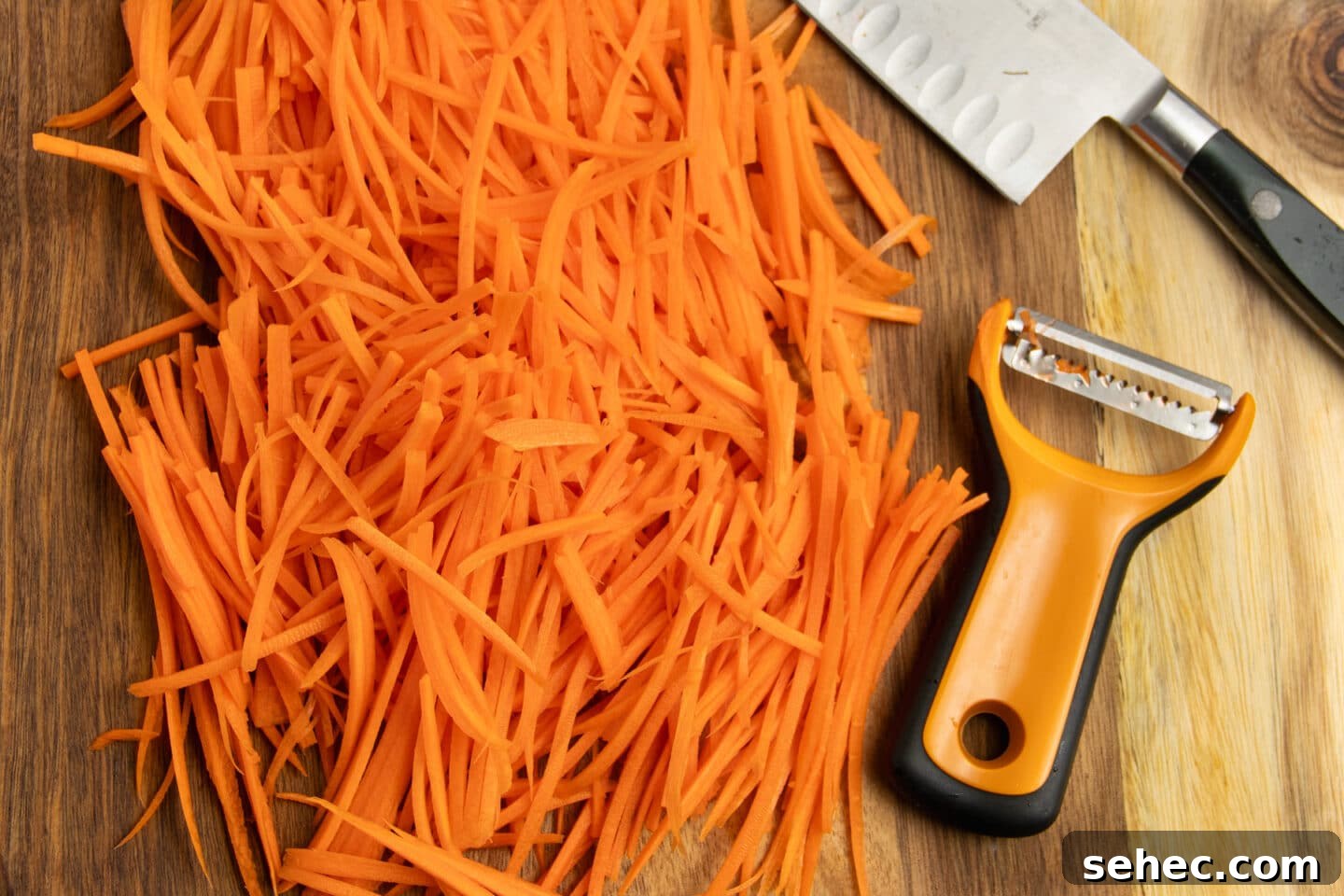 Crunchy Cucumber Carrot Salad Recipe 5 This is a picture of carrots being cut into matchsticks.