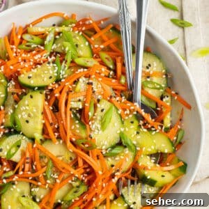 Crunchy Cucumber Carrot Salad Recipe 10 This is square picture of cucumber and carrot salad in a bowl.