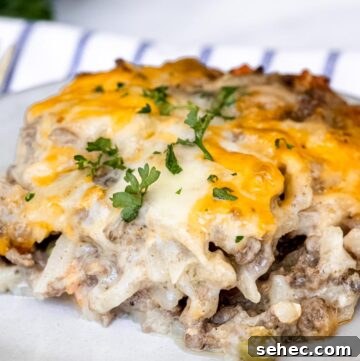 Cheesy Hamburger Hash Brown Casserole Recipe 2 a slice of hamburger hashbrown casserole on a plate