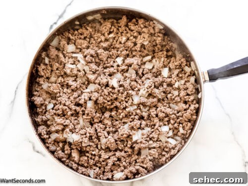 Cheesy Hamburger Hash Brown Casserole Recipe 3 Step 2 how to make easy hamburger hashbrown casserole, Brown the ground beef, drain off excess fat. Set aside.