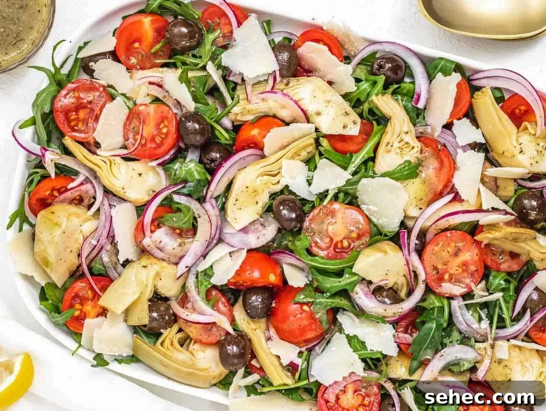 Mediterranean Artichoke Salad with Lemon Vinaigrette 7 Artichoke Salad with dressing and shaved parmesan.