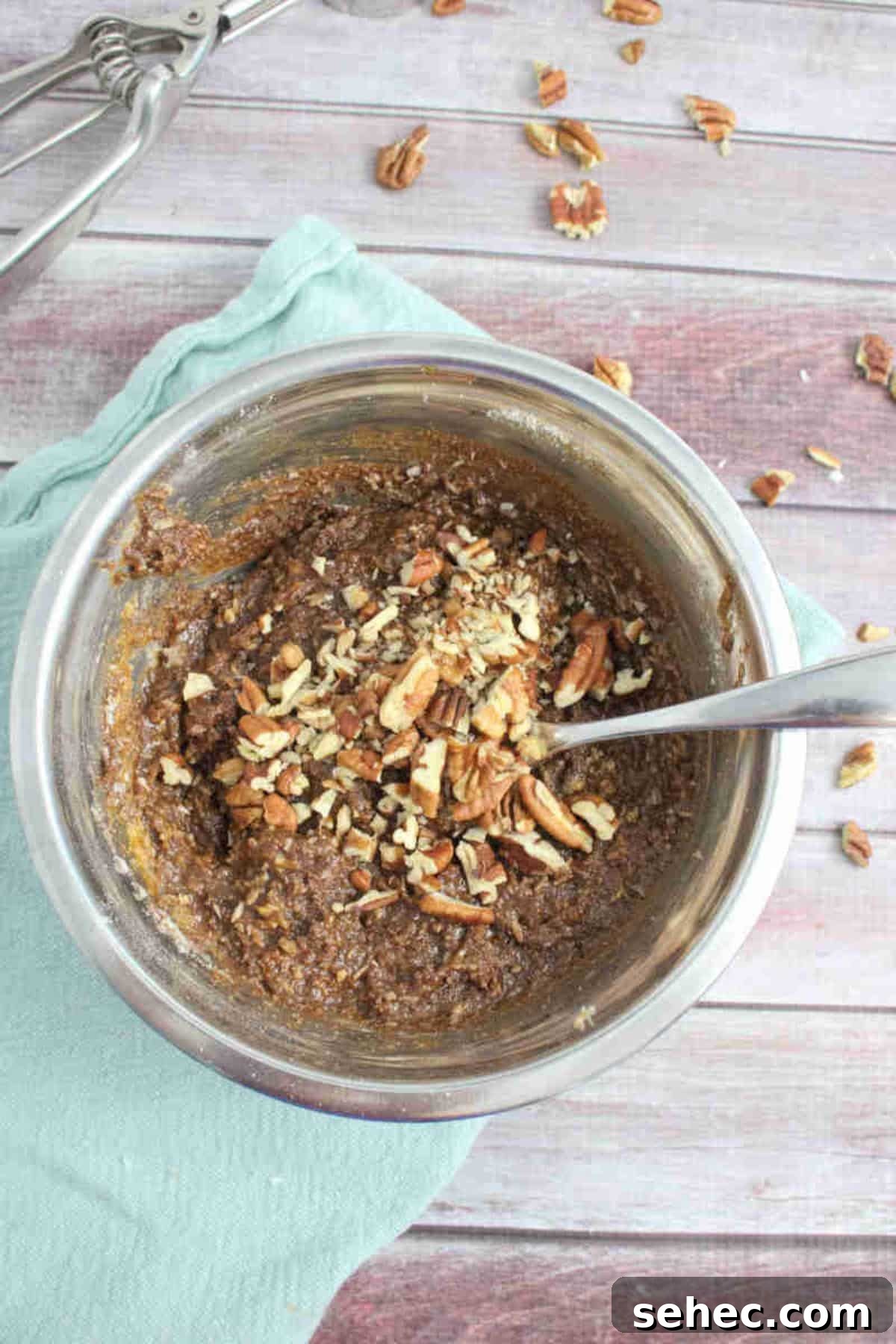 High Protein Cookies for Pregnancy 5 High protein pregnancy cookie batter in a steel bowl with a fork in it being mixed.