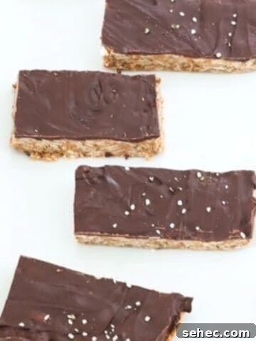 Four Peanut Butter Protein Bars on a white dish.