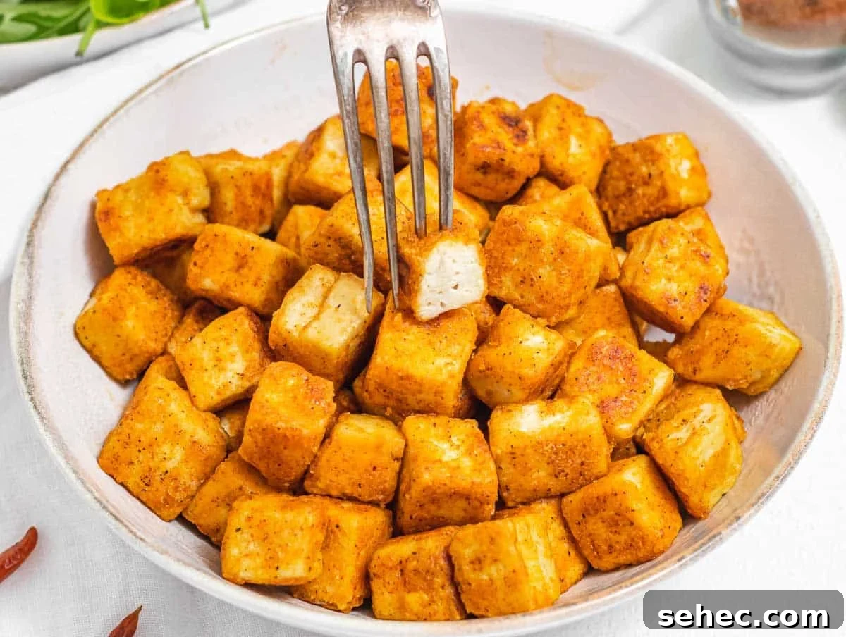 Yaki Udon Stir Fried Noodles 14 Fried tofu with a silver fork
