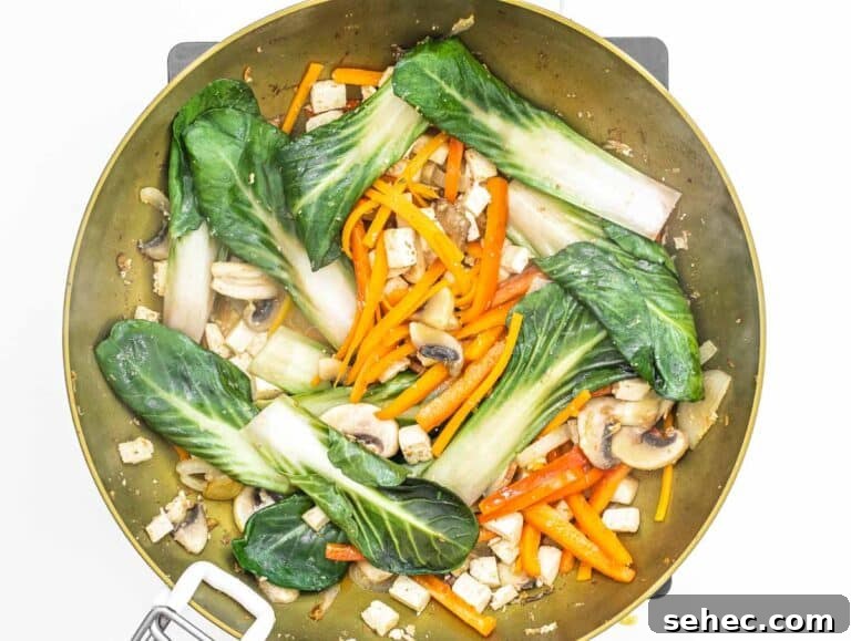 Yaki Udon Stir Fried Noodles 30 stir fried vegetables in a wok