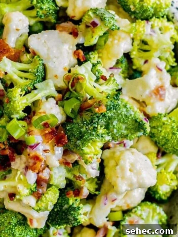 Crispy Baked Goat Cheese Balls Recipe 16 broccoli and cauliflower salad in a speckled bowl with bacon and peas