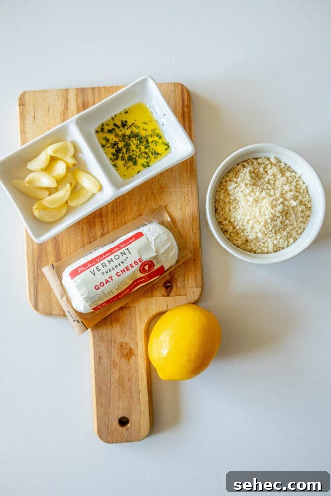 Crispy Baked Goat Cheese Balls Recipe 5 goat cheese, garlic, olive oil and herbs, lemon, and breadcrumbs on a table