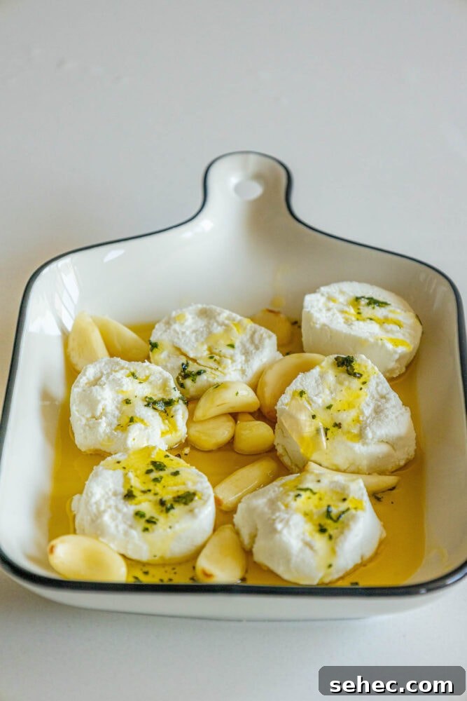 Crispy Baked Goat Cheese Balls Recipe 7 goat cheese marinating in olive oil and garlic