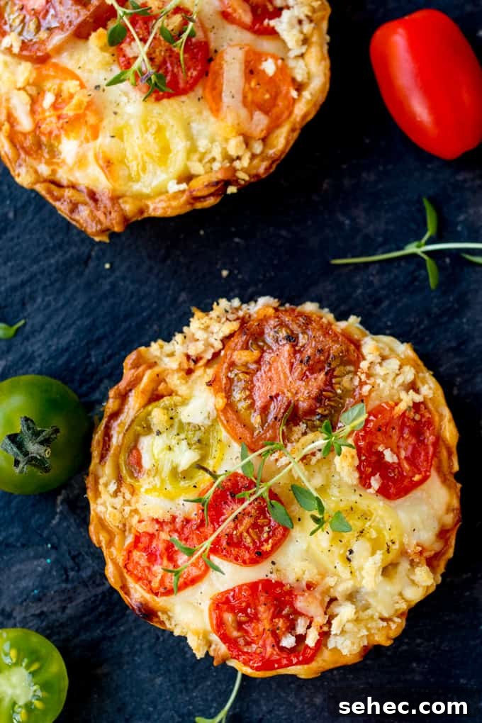 Cheese and Tomato Tarts: Not Quiche 2 Cheese and Tomato Tarts with a rich tomato ragu and creamy béchamel sauce encased in shortcrust pastry. The best vegetarian lunch!