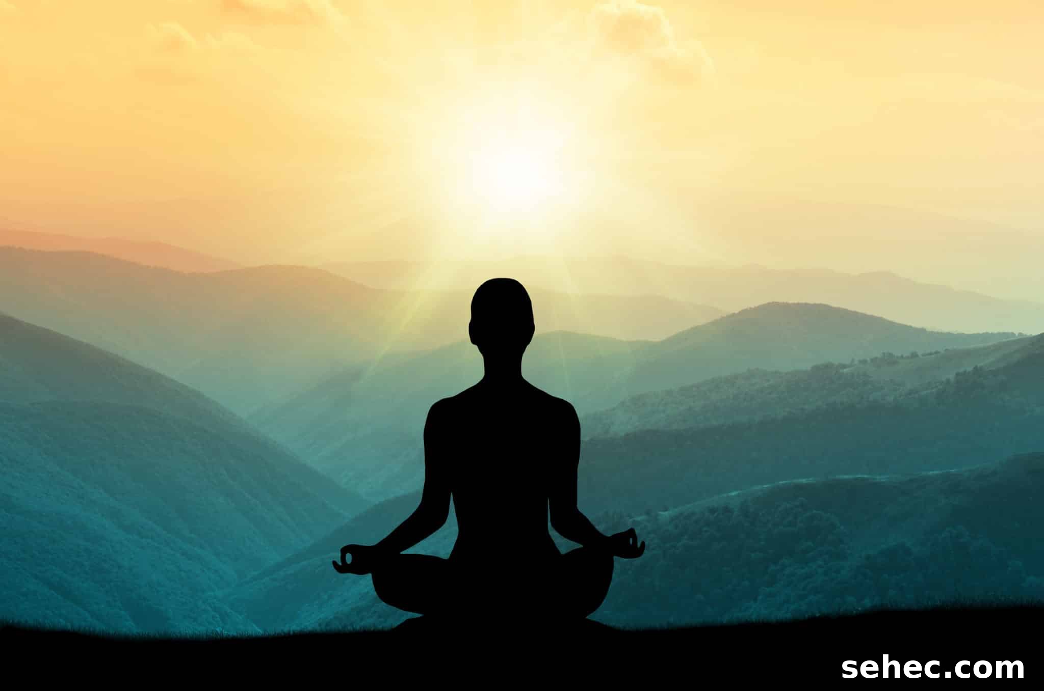 Meditation for Beginners Step by Step Guide 2 Woman sitting in meditation pose outdoors looking at the mountains and sunset