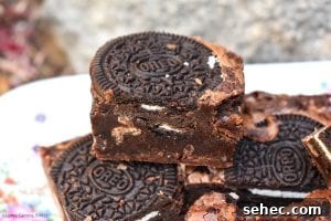 Fudgy Oreo Brownies with a Rich Chocolate Center 8 A tray of baked Oreo brownies ready to slice