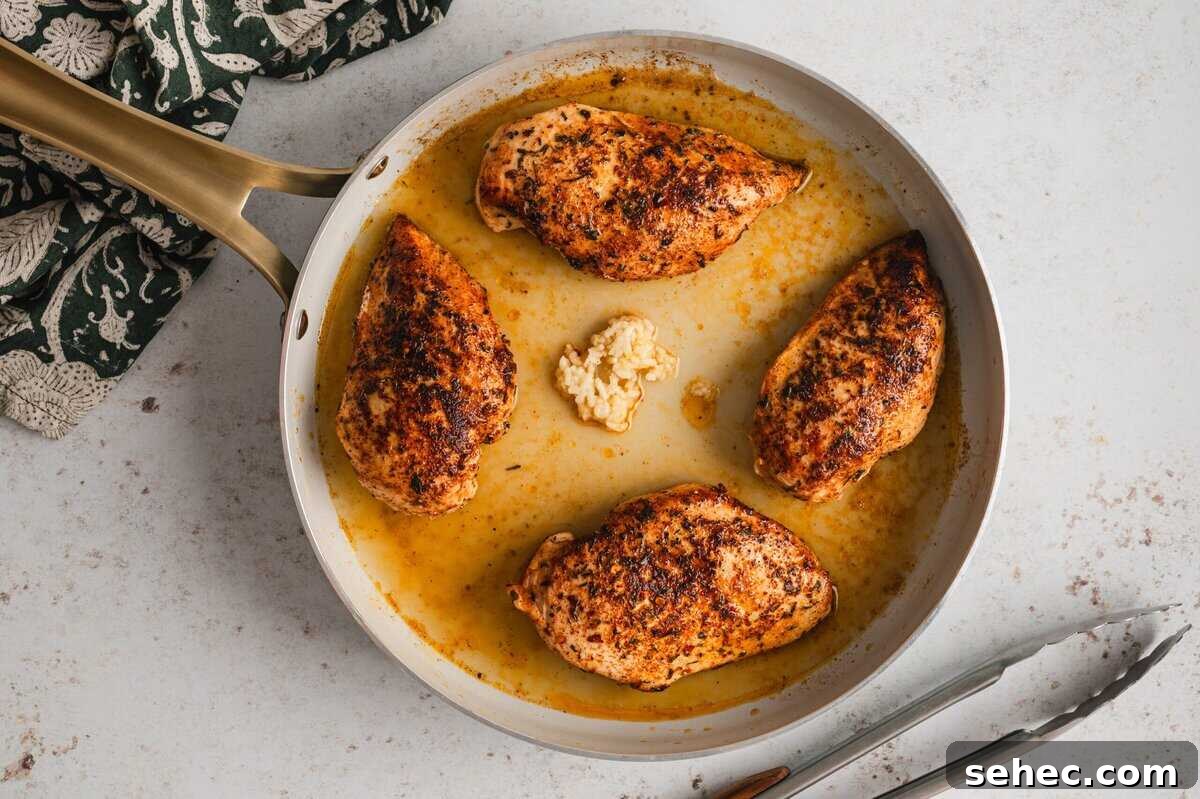 Garlic Lime Chicken Recipe with Juicy Citrus Flavor 6 Garlic and lime juice added to the skillet with the chicken.