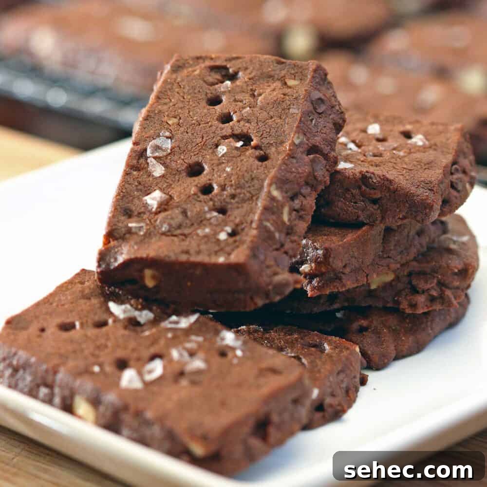 Buttery Chocolate Shortbread Cookies Recipe 2 These crisp, buttery chocolate shortbread cookies are loaded with malt, chopped pecans and the cocoa cookie dough has chocolate chips!