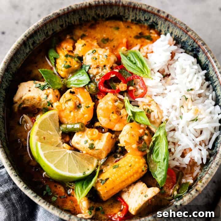 Indian Butter Chicken Recipe with Creamy Tomato Sauce 4 Thai red curry in a bowl with vegetables and chicken.