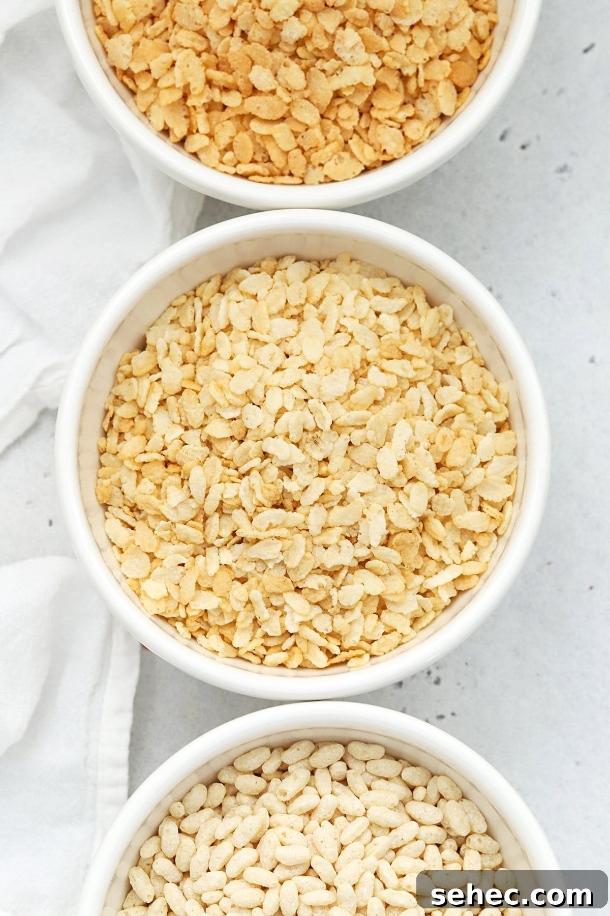 Are Rice Krispies Gluten Free? No, Try These Brands 2 Overhead view of three bowls of gluten-free rice krispies cereals