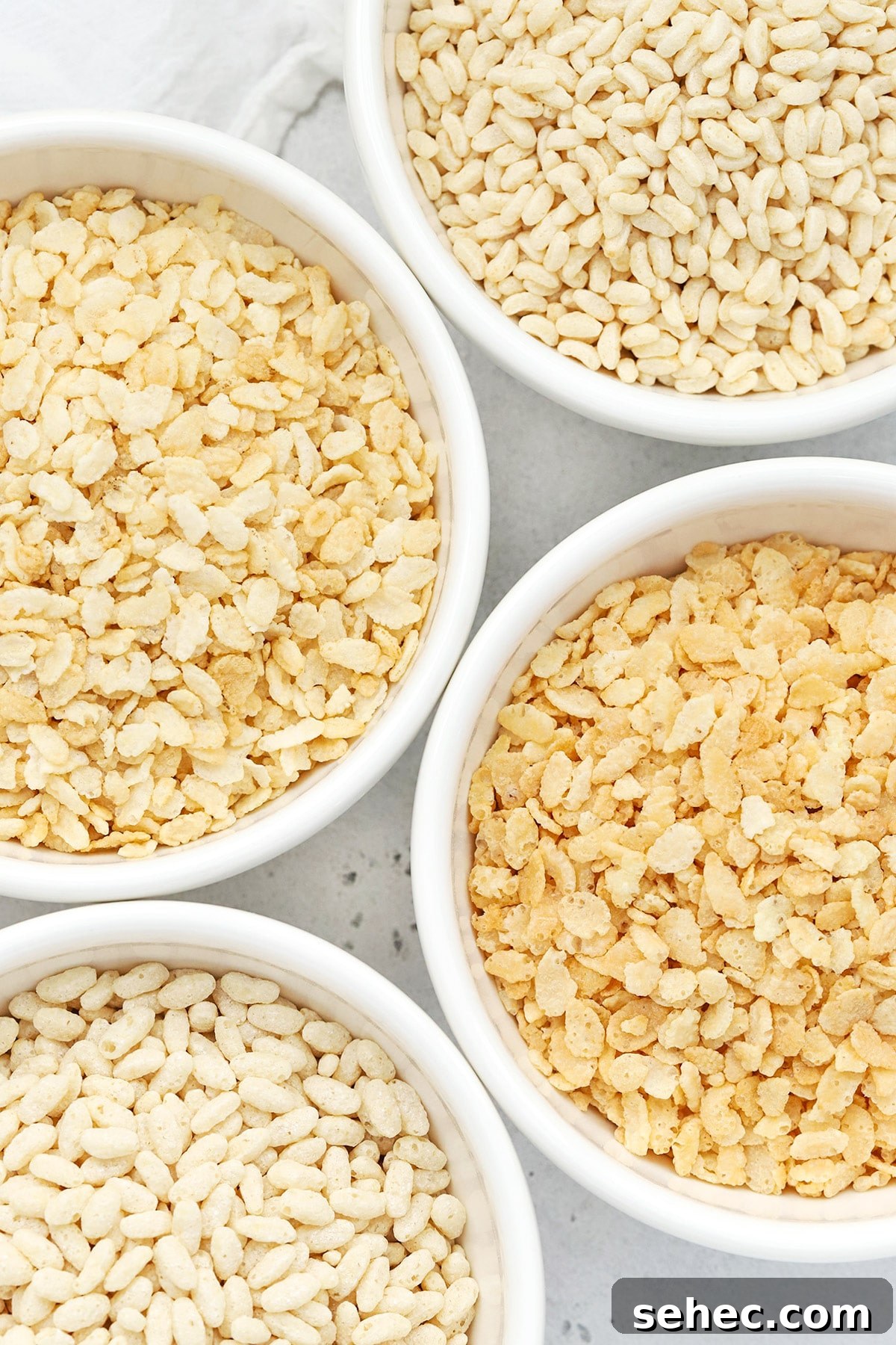 Are Rice Krispies Gluten Free? No, Try These Brands 3 Overhead view of four bowls of gluten-free crisp rice cereals