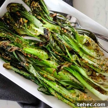 roasted bok choy on a white platter