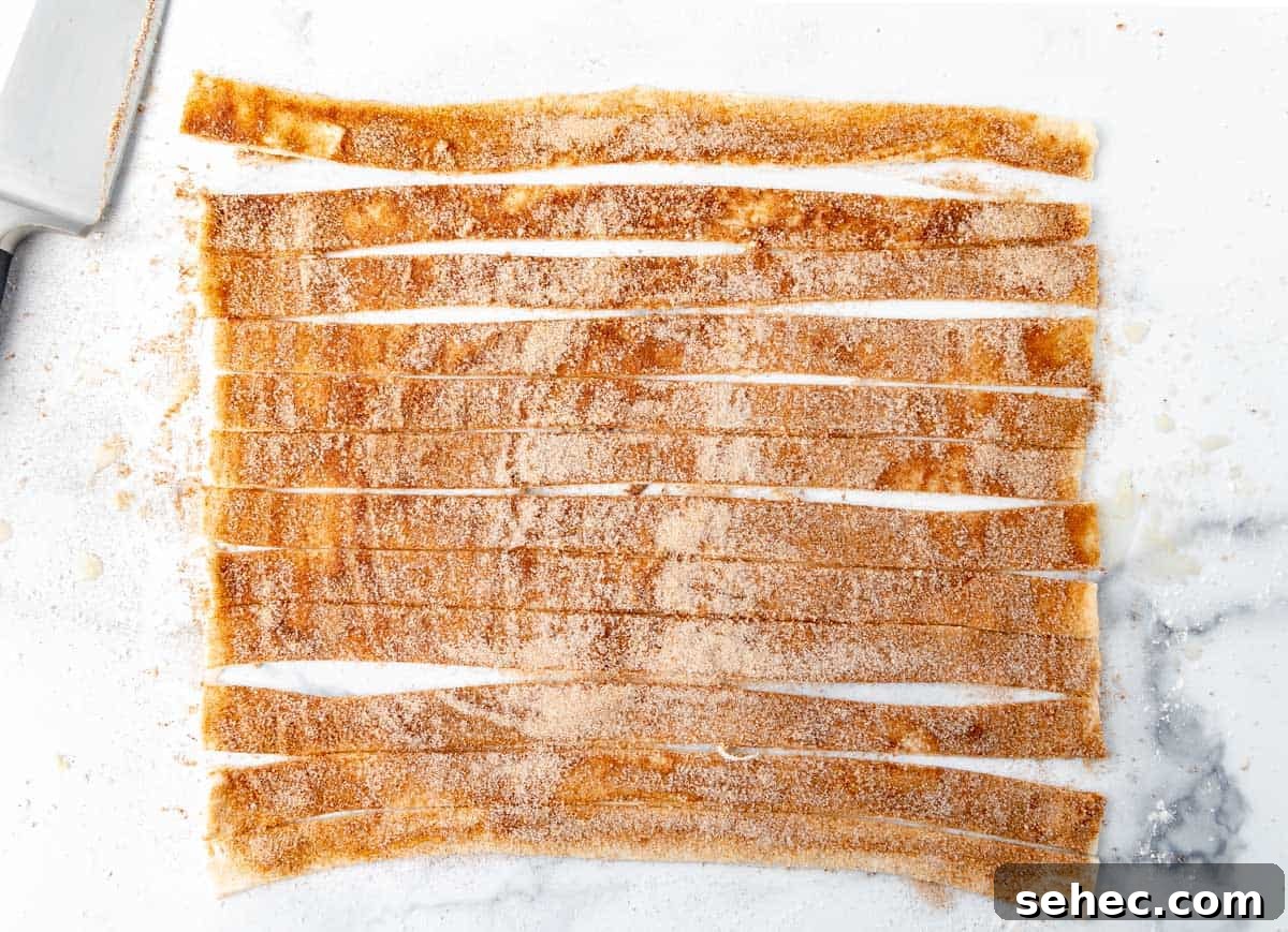 Cinnamon Sugar Puff Pastry Twists 5 Slice the puff pastry into 12 thin strips