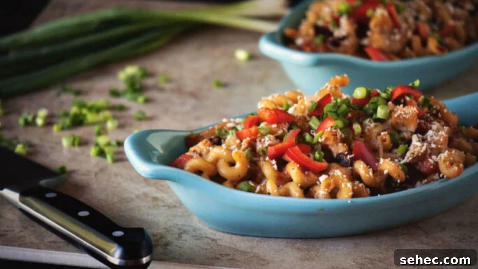 Mac and cheese cooked fiesta style with peppers.