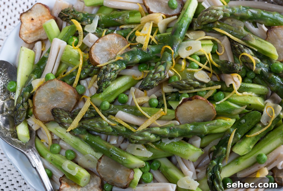 Spring Asparagus Pasta Baked in Parchment 12 Vegetable loaded asparagus pasta with spring vegetables