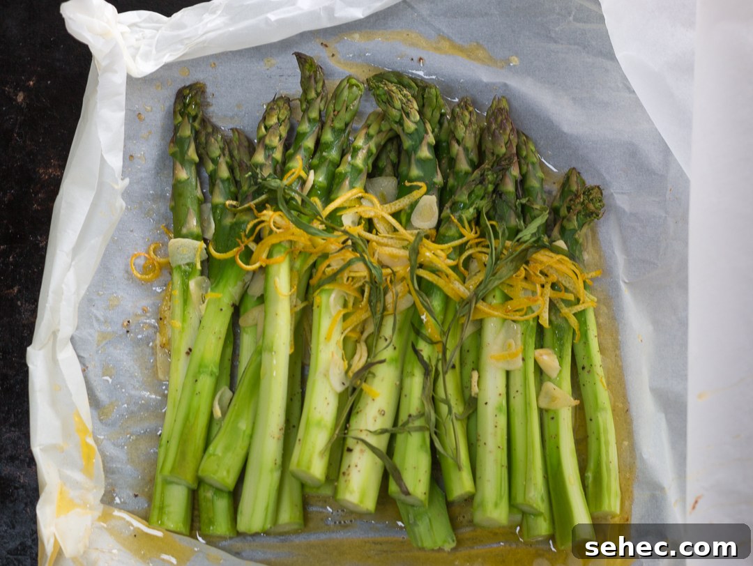 Spring Asparagus Pasta Baked in Parchment 10 Opening parchment packet of asparagus and sauce to pour over pasta