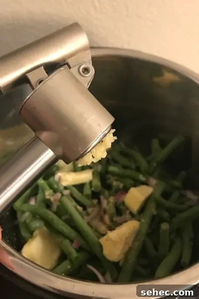 Instant Pot Garlic Green Beans Recipe 5 garlic press