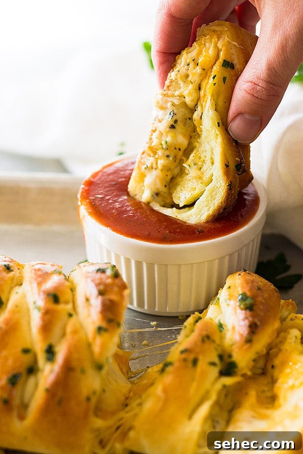 Three Cheese Braided Bread Recipe 6 This Three Cheese Braid is filled with gooey melted cheese and is great dipped in homemade pizza sauce!