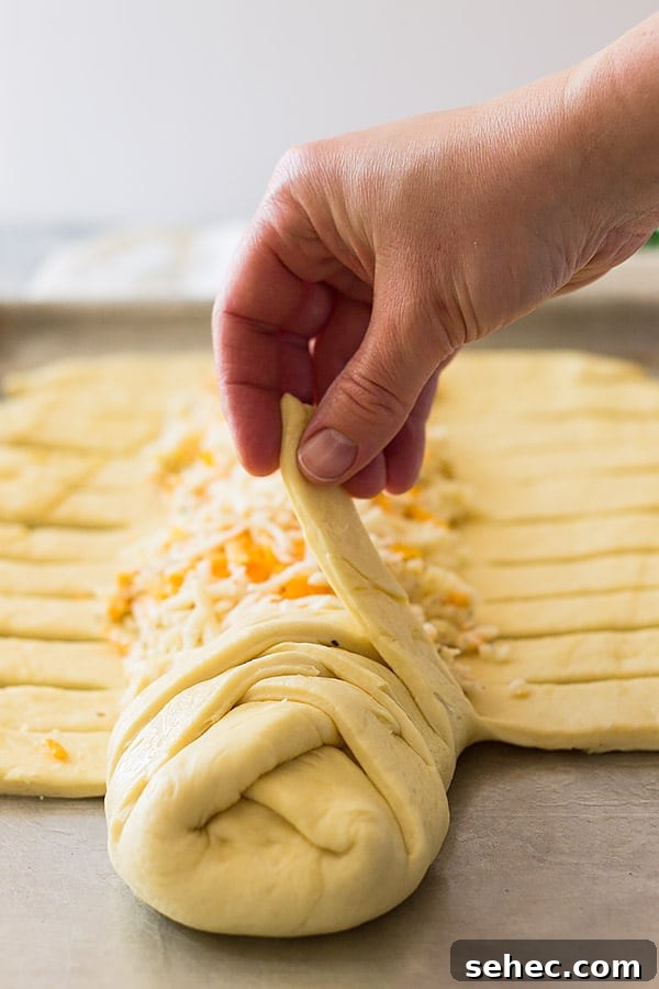 Three Cheese Braided Bread Recipe 8 Three cheese braid showing how to braid the dough.