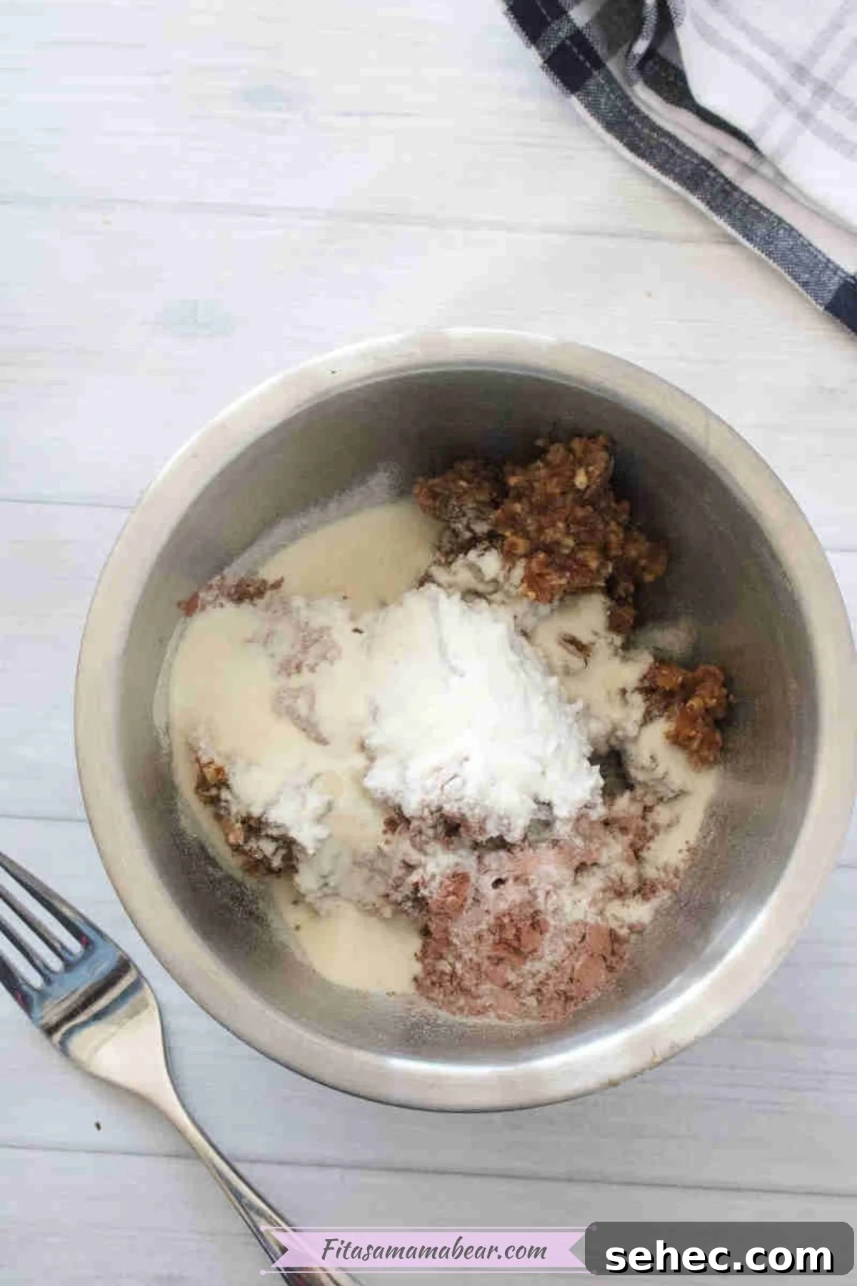 Dairy Free Chocolate Mint Protein Bars Recipe 5 Collagen, cacao powder, and dates in a steel bowl.