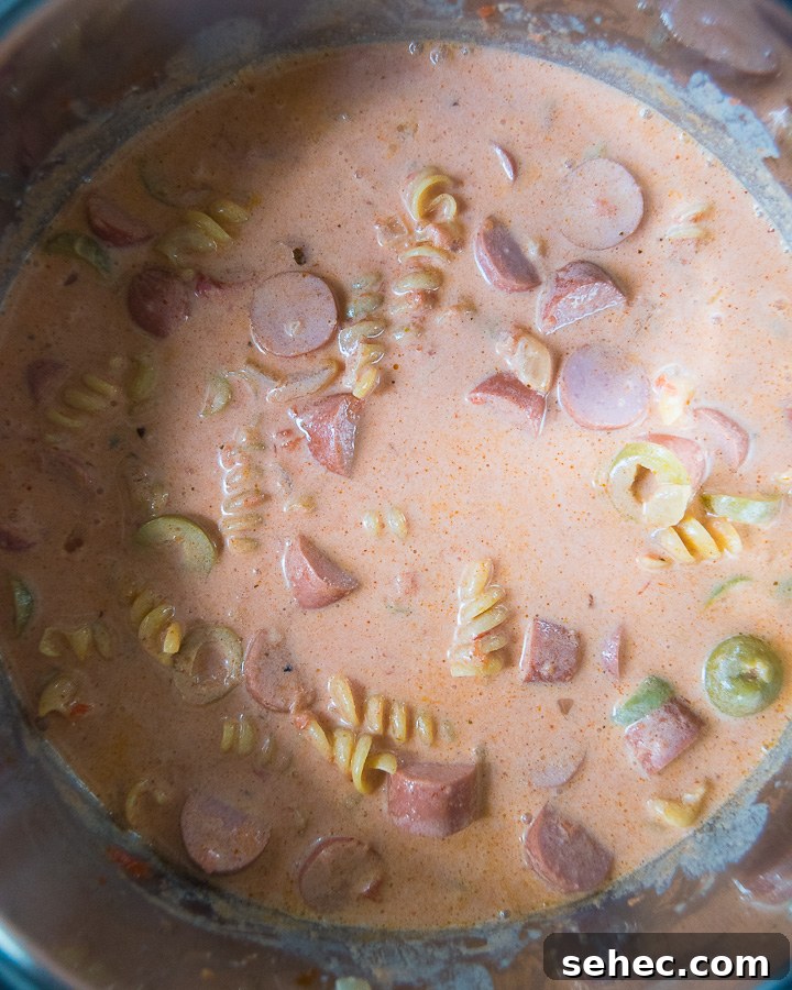 Creamy Hot Dog Pasta Recipe with Tomato Sauce 7 all the ingredients for hot dog pasta in an instant pot before cooking
