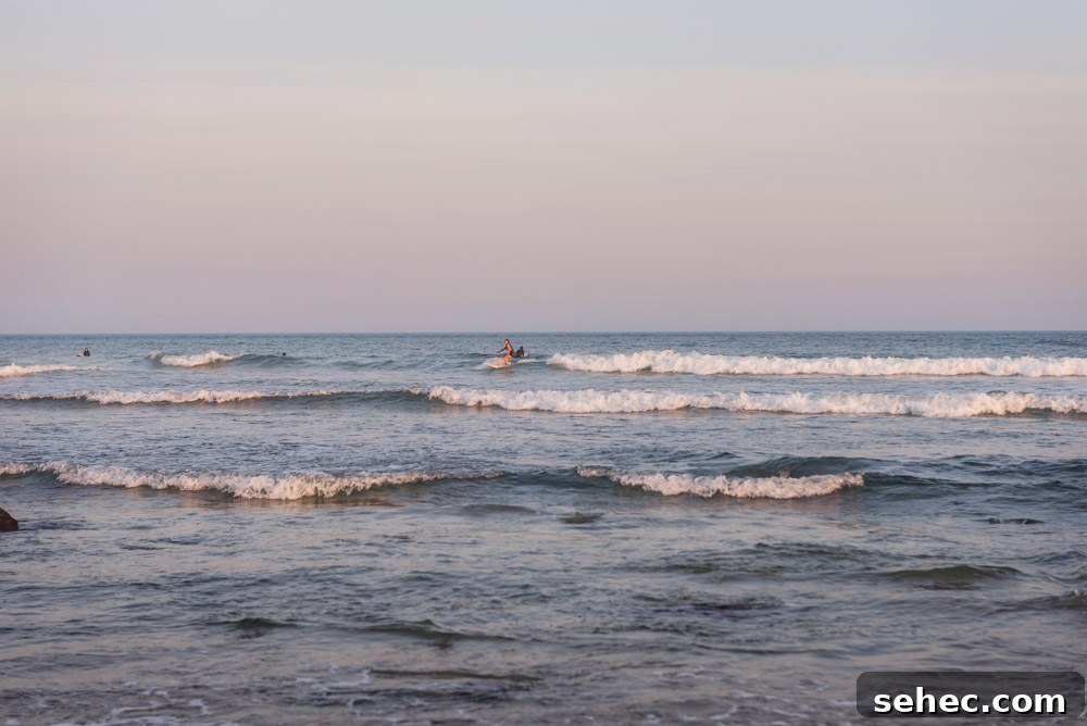 Ditch Plains Surf Guide Waves Tides and Local Tips 5 Chef Daniela Gerson doing a turn on the wave in Ditch Plains, NY.