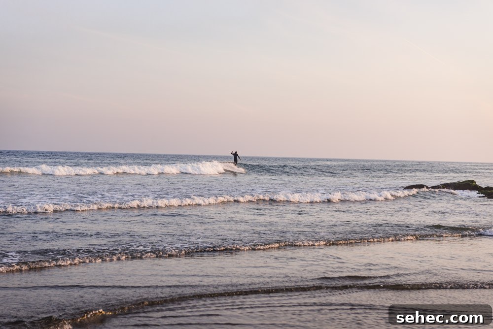 Ditch Plains Surf Guide Waves Tides and Local Tips 7 A surfer going left on a wave in Ditch Plains, NY.