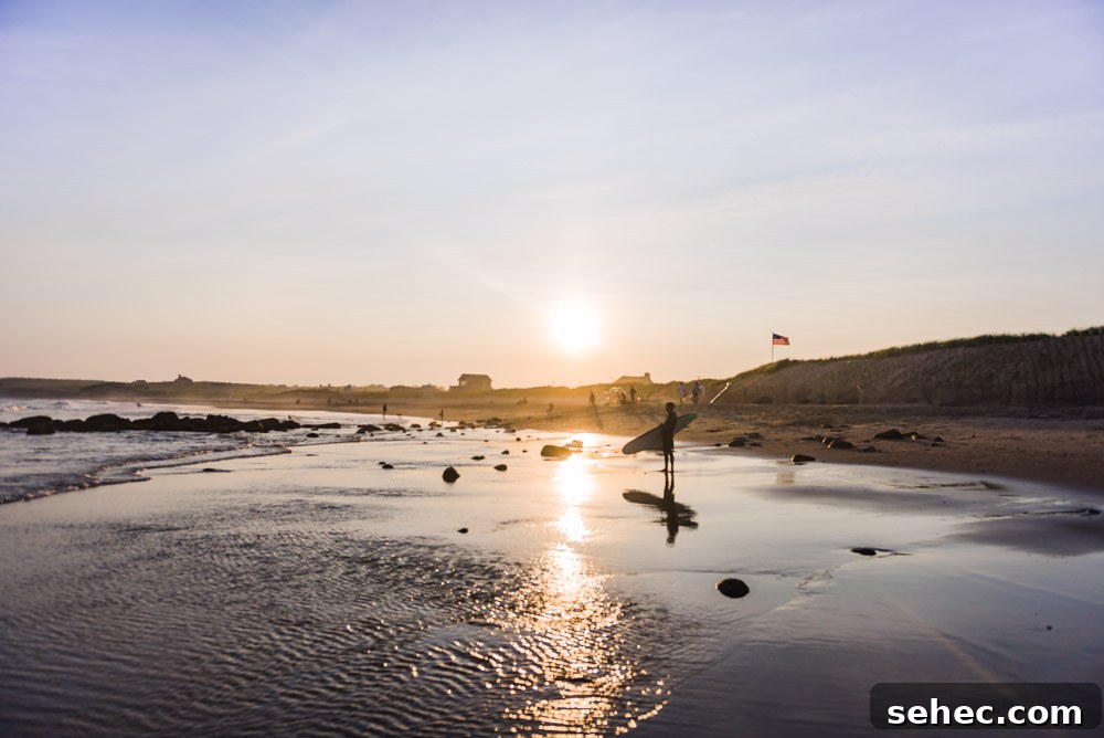 Ditch Plains Surf Guide Waves Tides and Local Tips 8 Surfers at sunset in Ditch Plains, NY.