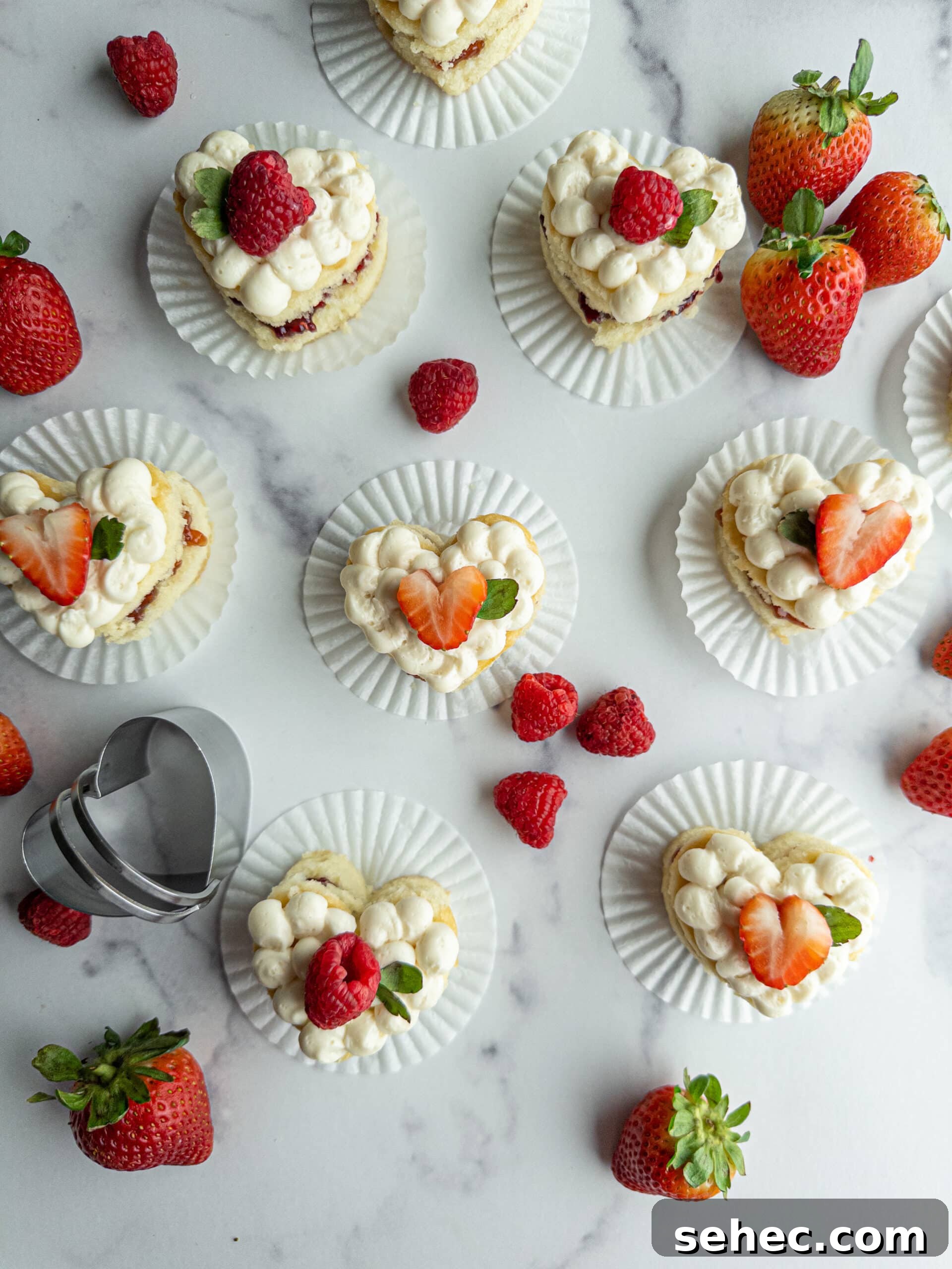 Mini Heart Cakes Made Two Ways 9 Mini heart cakes cut out with a heart biscuit cutter.