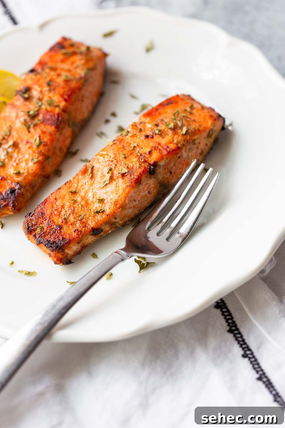 Crispy Skin Air Fryer Salmon Recipe 4 salmon with parsley garnish