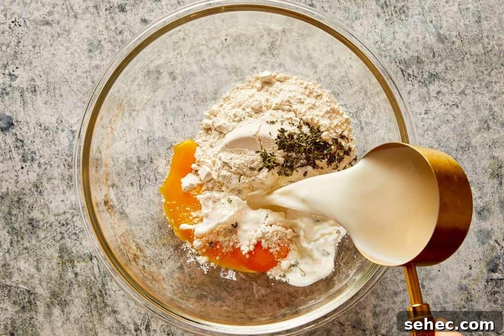 Truffle Beef Wellington Recipe with Red Wine Sauce 7 mix of flour, egg and milk in a bowl to make the crepes