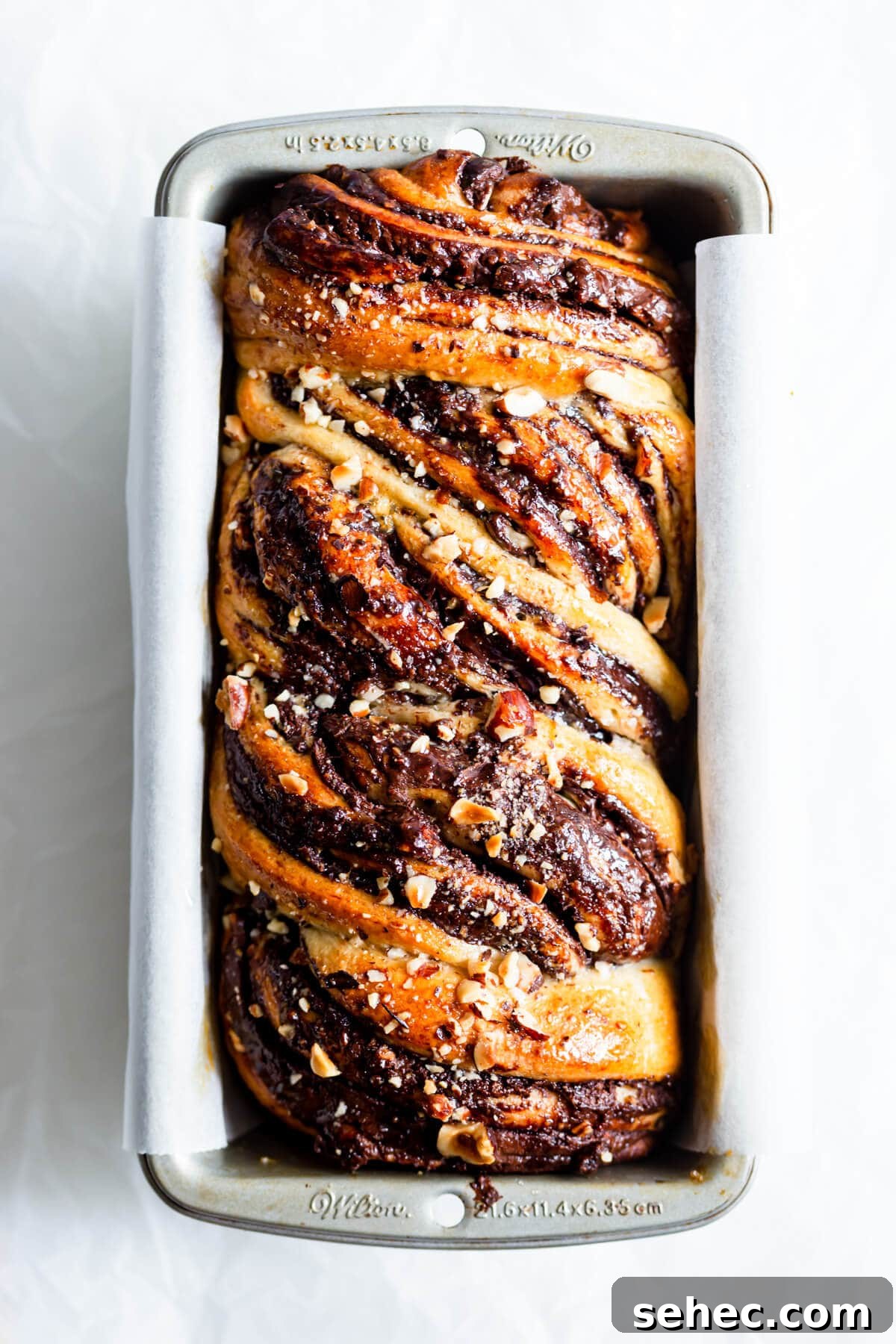 Nutella Babka Recipe: Chocolate-Hazelnut Swirl Loaf 12 overhead close up of baked nutella babka in loaf tin
