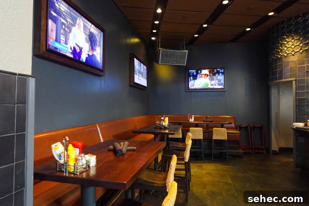 Rix Sports Bar and Grill - Live Sports, Craft Beer and Burgers 3 dining area and sports on the tvs.