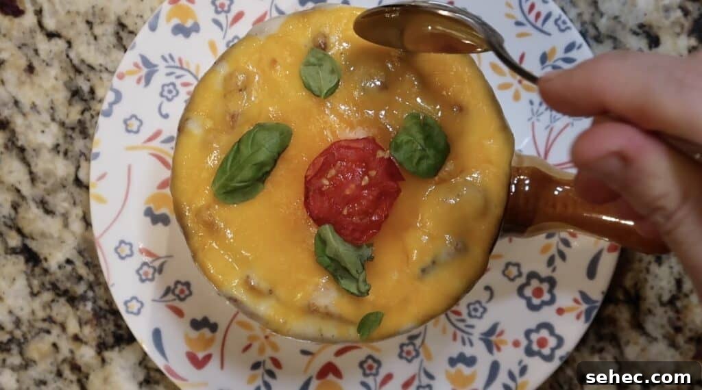 Spoon going into soup
