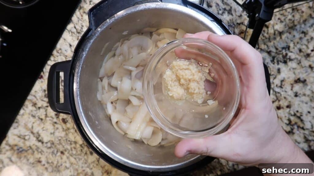 Adding garlic to pot