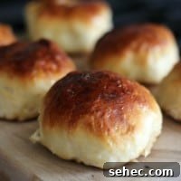 pretzel rolls on cutting board